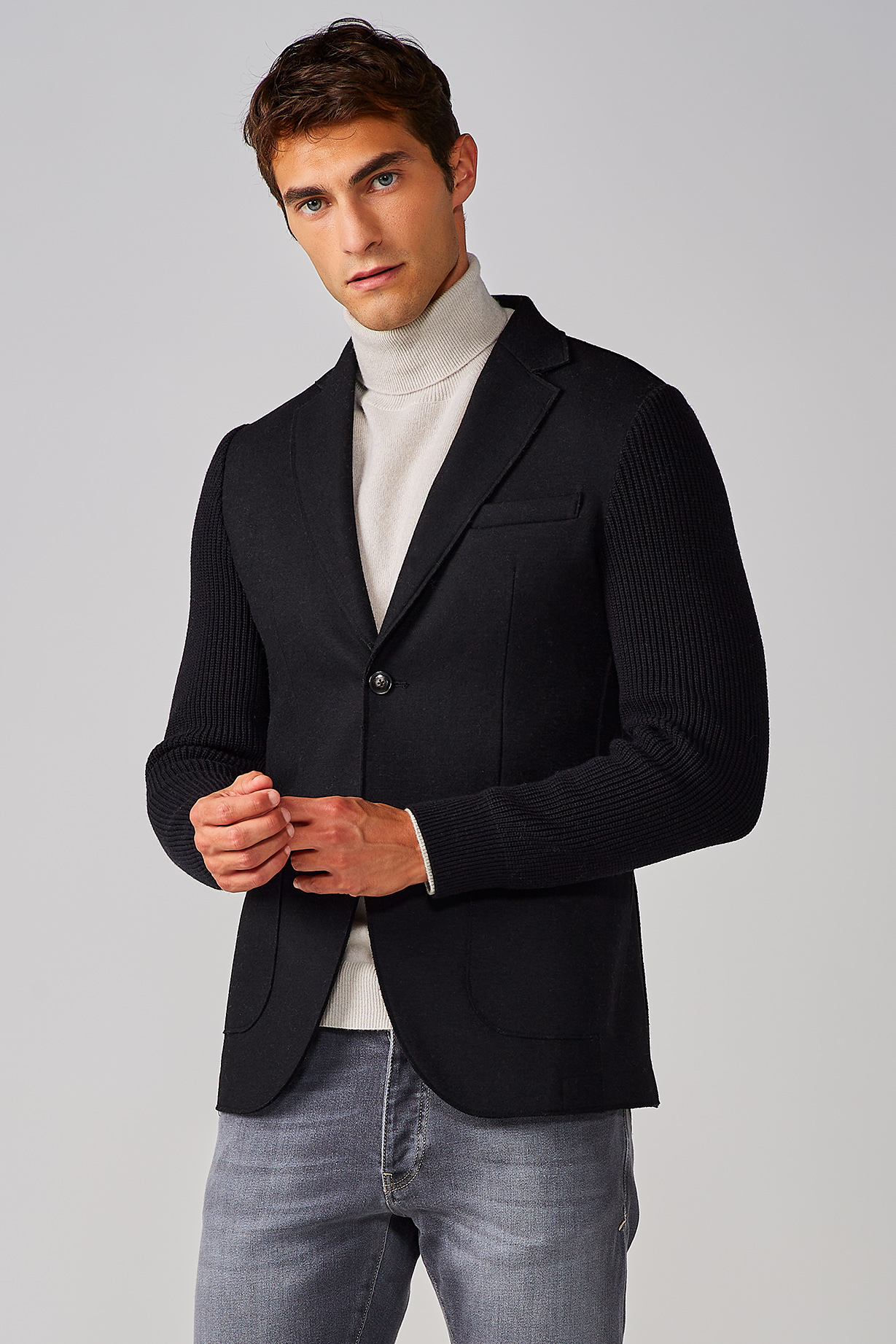 BLACK JACKET WITH KNITTED SLEEVES